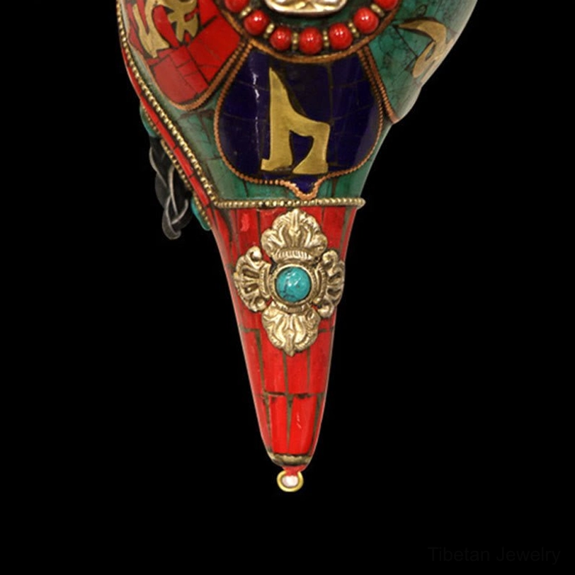 Tibetan blessed shankha conch shell with eight auspicious symbols and enlightenment mantras