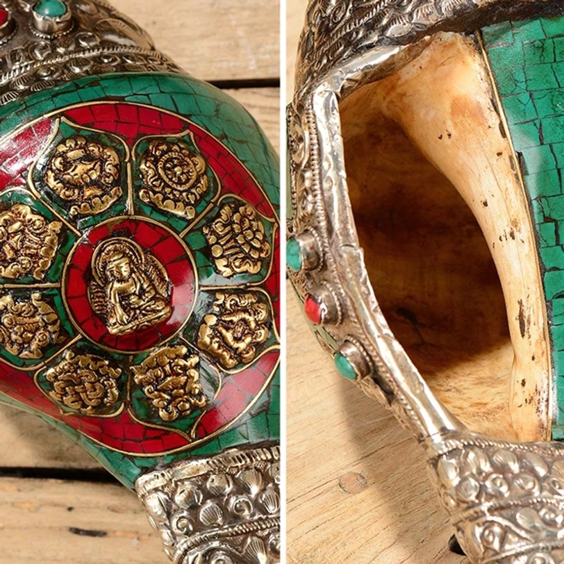 Tibetan handmade shankha conch shell ornament showing detailed silver filigree carving technique and natural conch texture with aged patina