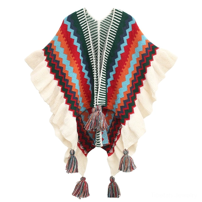 Tibetan shawl in beige, red and blue striped pattern with ruffled hem and tassel details showcasing vibrant color harmony