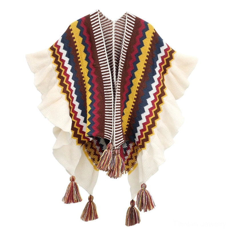 Tibetan shawl in beige, yellow and brown color palette with geometric striped pattern and ruffled hem detail