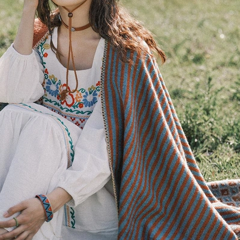 Tibetan ethnic shawl draped casually showing everyday wearability and comfort for casual occasions and layering
