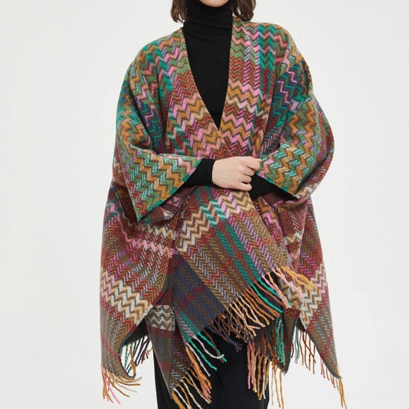 Close-up front view of Tibetan shawl wearer showing wavy chevron pattern and fringe