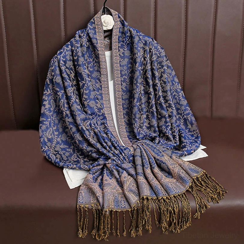 Tibetan tassel shawl fringe hem detail showcasing decorative beaded or twisted fringe trim characteristic of traditional Himalayan textile design