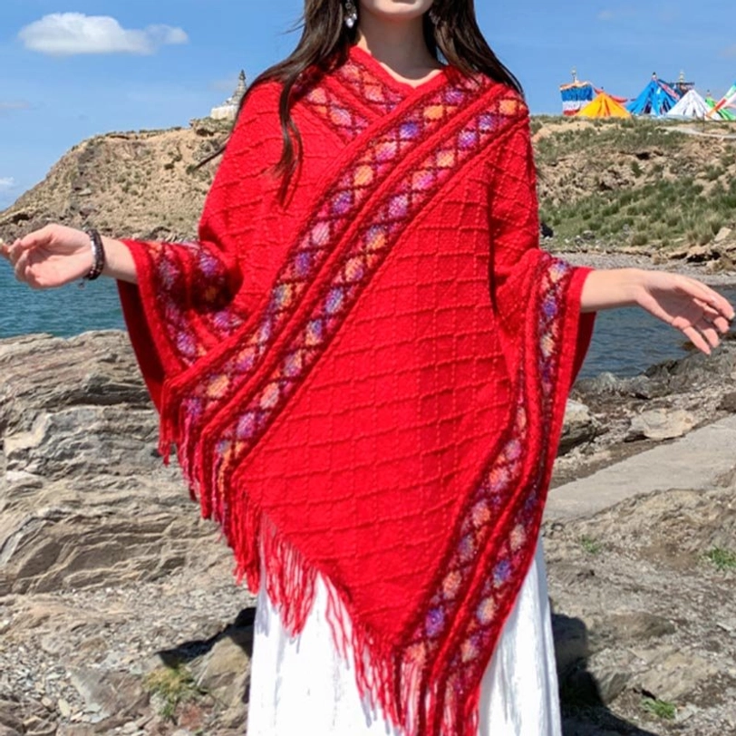 Tibetan poncho shawl draped styling showing versatility as wrap and ethnic fashion accessory