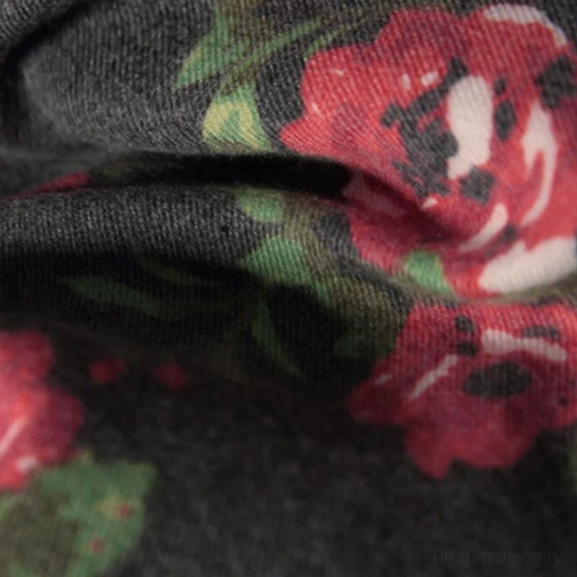 Tibetan rose floral shawl elegant draped presentation on solid background for home or travel use