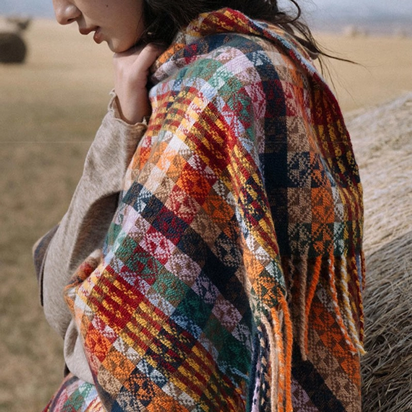 Tibetan bohemian striped shawl wrapped as evening wear showing elegant sophisticated styling option