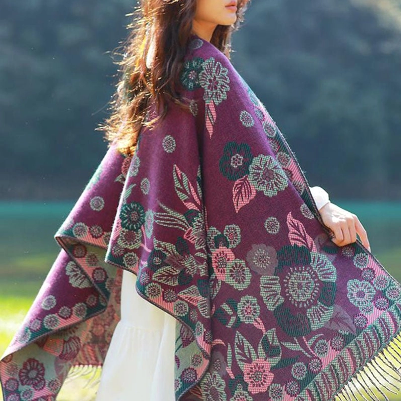 Green Tibetan floral cashmere shawl showcasing nature-inspired leaf patterns