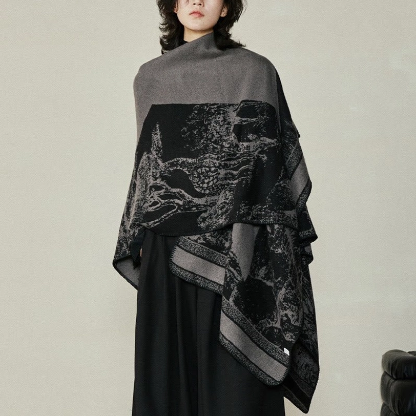 Oversized Tibetan reversible shawl lower body view showcasing large forest animal jacquard design