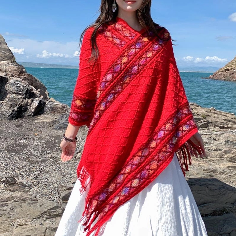 Tibetan ethnic shawl layered over outfits demonstrating bohemian fashion versatility and cultural charm