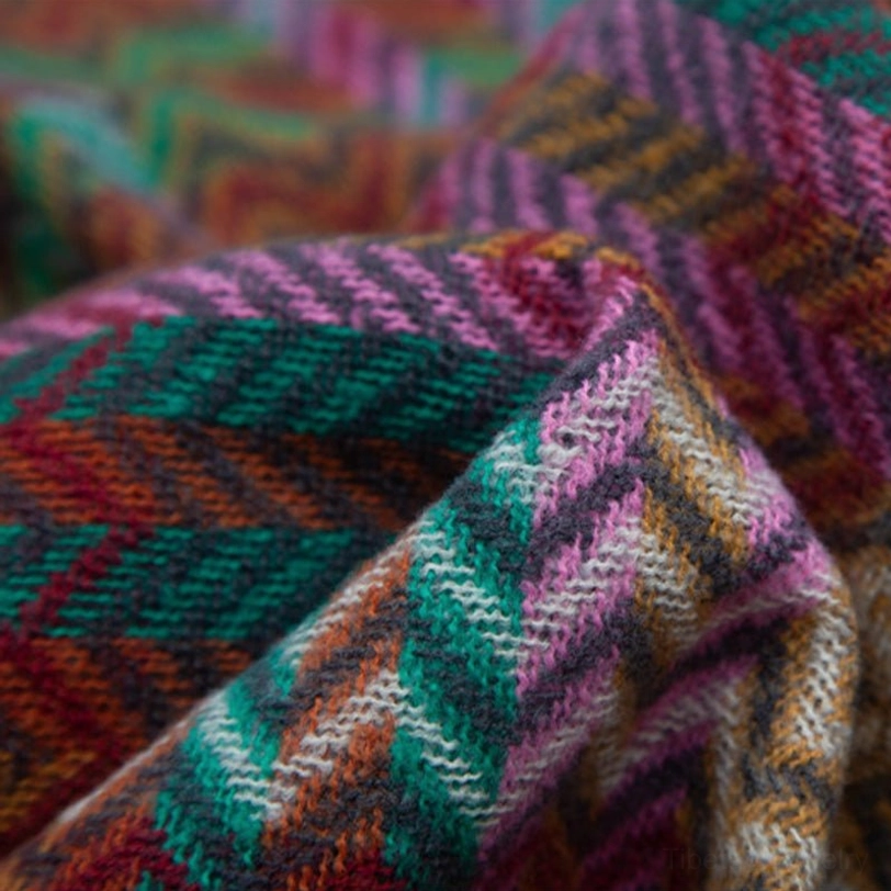 Tibetan tassel shawl layering option over casual sweaters and turtlenecks