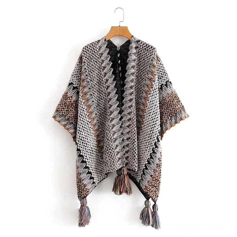 Tibetan striped knit shawl detail shot highlighting fine mohair blend texture and artisanal tassel craftsmanship