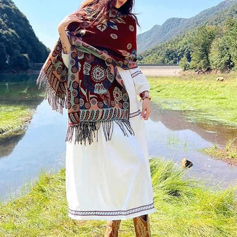 Purple red Tibetan floral wrap with traditional sacred pattern weave