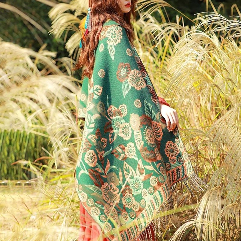 Tibetan floral pattern shawl worn as elegant shoulder drape at events