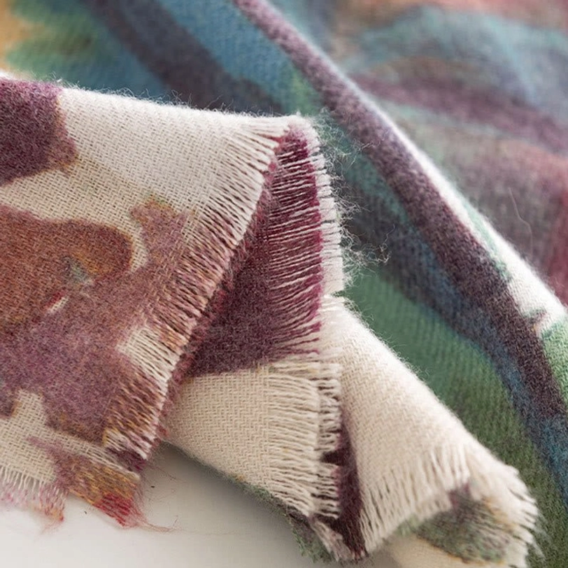 Tibetan watercolor scarf displayed to show fabric softness and elegant floral print composition