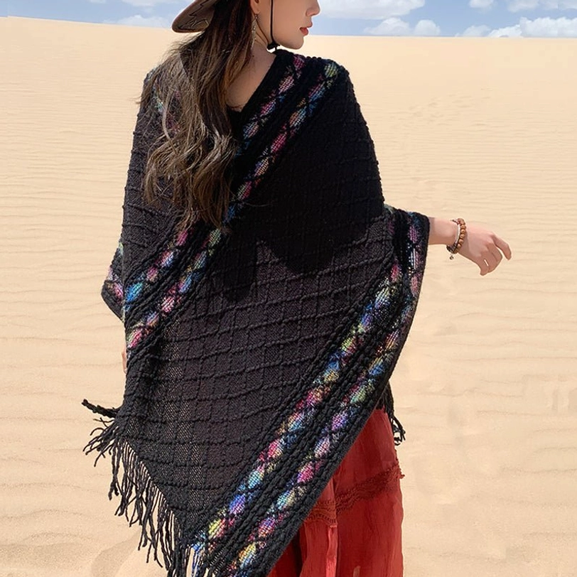 Tibetan rhombus knit tassel shawl close-up texture detail showing ethnic weave pattern and craftsmanship