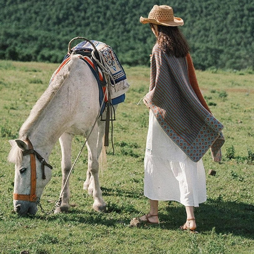 Tibetan diamond striped shawl travel use as lightweight blanket on journey demonstrating versatile functionality