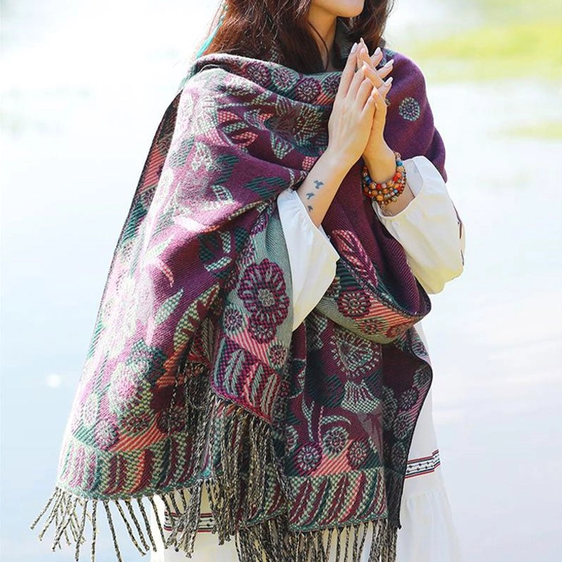 Tibetan floral pattern shawl draped for travel and portability demonstration