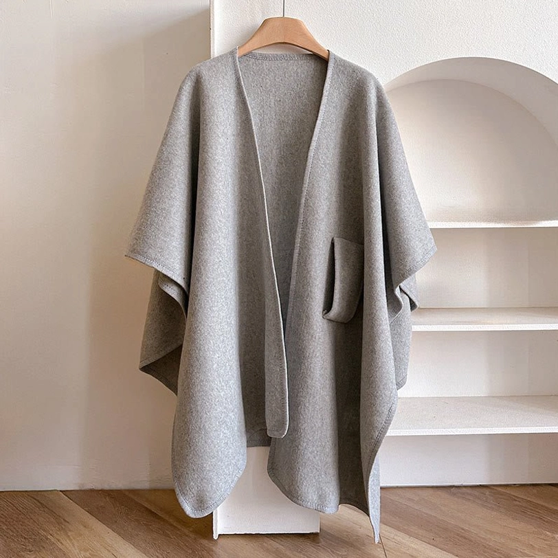 Tibetan split shawl wrap worn styling - demonstration of versatile layering over casual clothing
