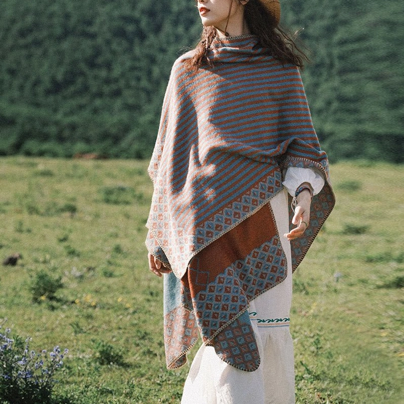 Tibetan ethnic shawl wrapped styling showing how to wear as evening wrap for formal occasions with cultural sophistication