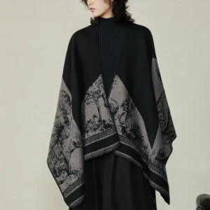 Tibetan sika deer forest reversible shawl wrap in black and gray, front view on model