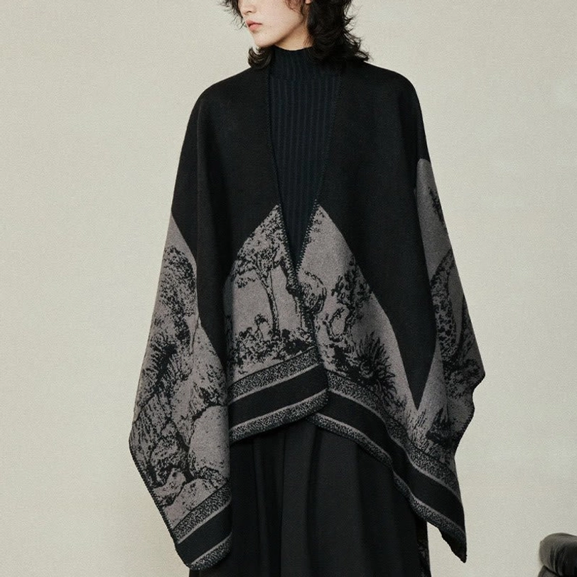 Tibetan sika deer forest reversible shawl wrap in black and gray, front view on model
