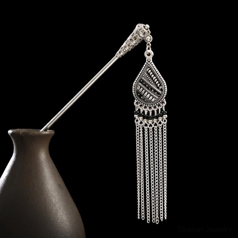 Silver tassel hairpin left profile with monochrome teardrop pendant and chain tassels