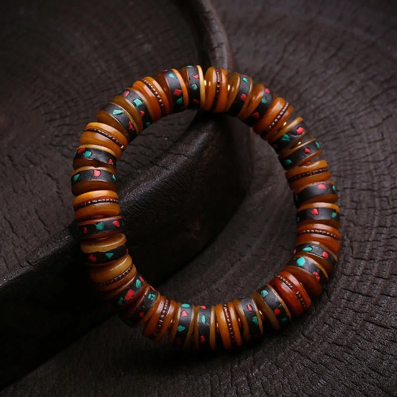 Tibetan bone bracelet with authentic skull charm, protective spiritual symbolism, and traditional handmade craftsmanship