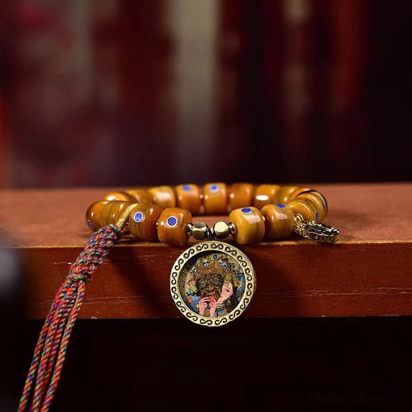 Tibetan spiritual bracelet with natural bone beads and Lazurite stone accents