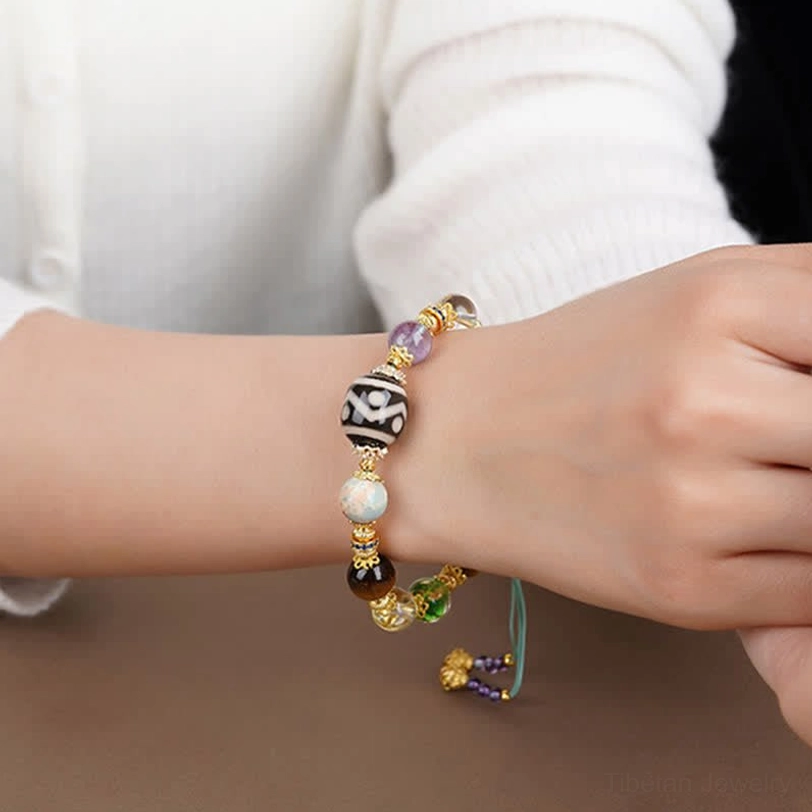 Tibetan spiritual bracelet with Dzi bead amethyst tiger eye and adjustable cord