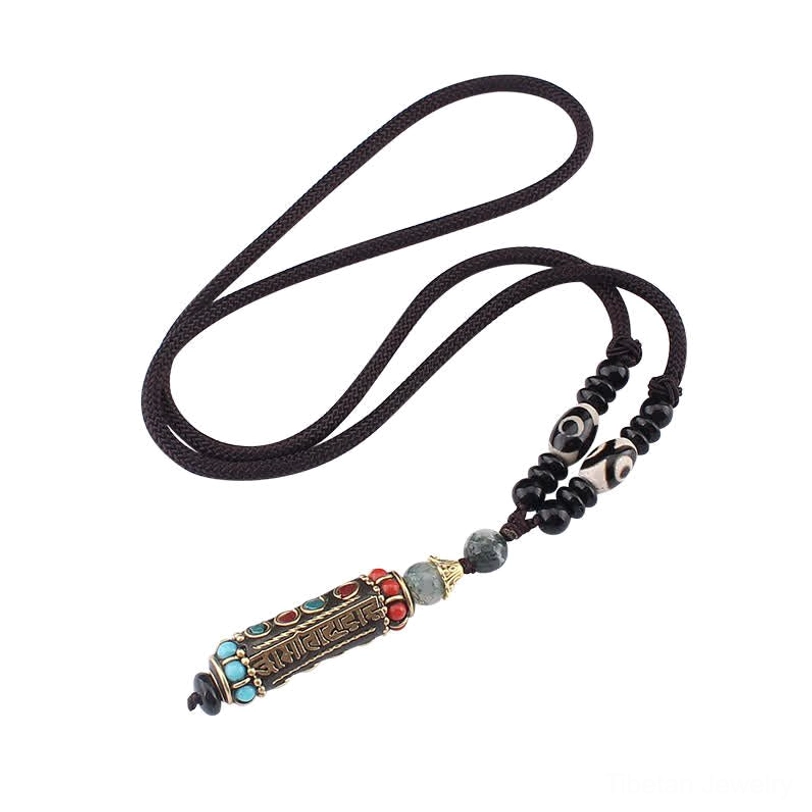 Tibetan spiritual necklace featuring Om Mani Padme Hum enamel pendant with sacred mantra