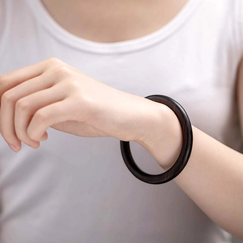 Tibetan wood protection bangle featuring sustainable natural materials and authentic Buddhist spiritual craftsmanship