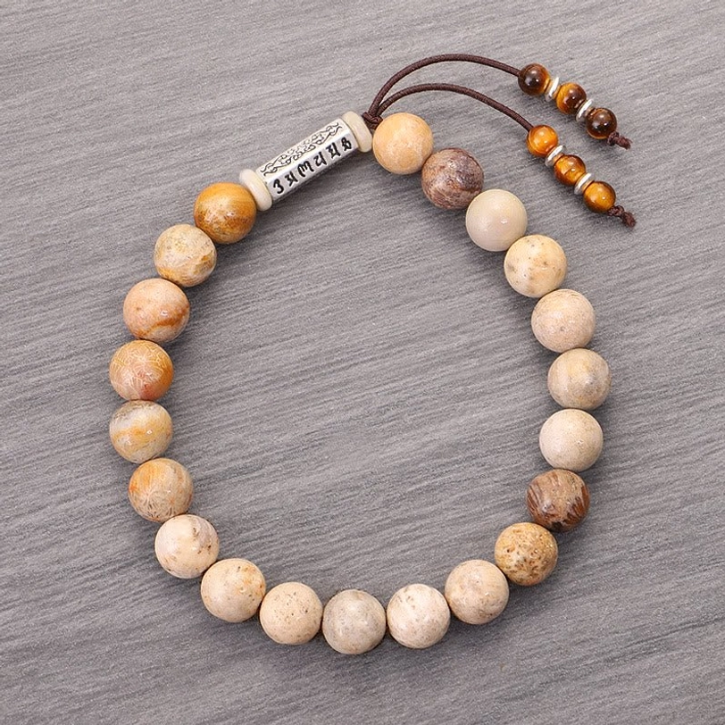 Complete Om Mani Padme Hum stone bracelet loop with uniform beads and adjustable tassel, product display view