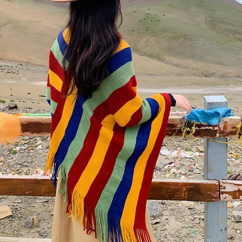 Tibetan striped shawl back view showing full stripe pattern and hem tassels worn with skirt