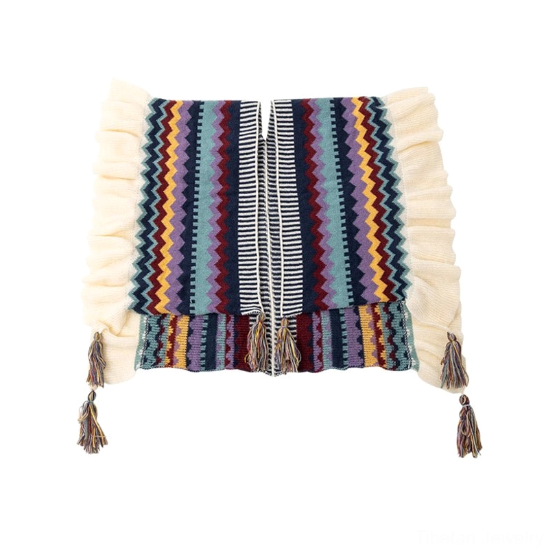 Tibetan striped knit shawl wrap in beige and multi-color pattern showing ruffled hem edge and tassel embellishments