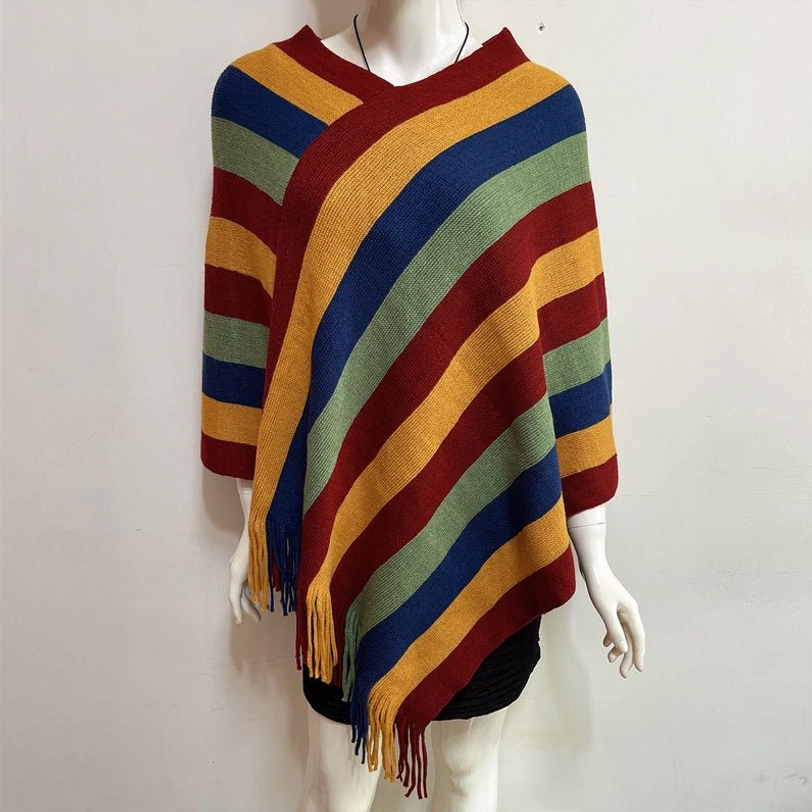 Tibetan striped shawl worn as evening wrap at formal gathering showing elegant draping technique