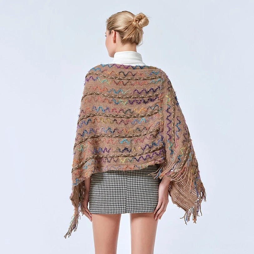 Tibetan tassel poncho shawl ideal for travel blanket or evening wear with cultural flair