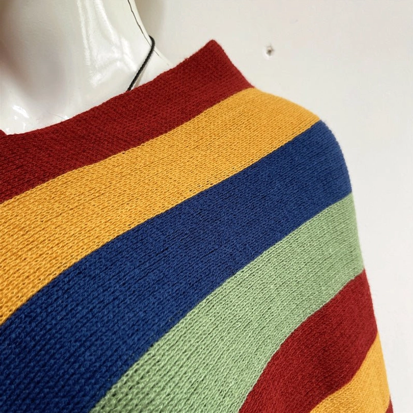 Tibetan tassel shawl textile close-up showing imitation cashmere softness and knit quality