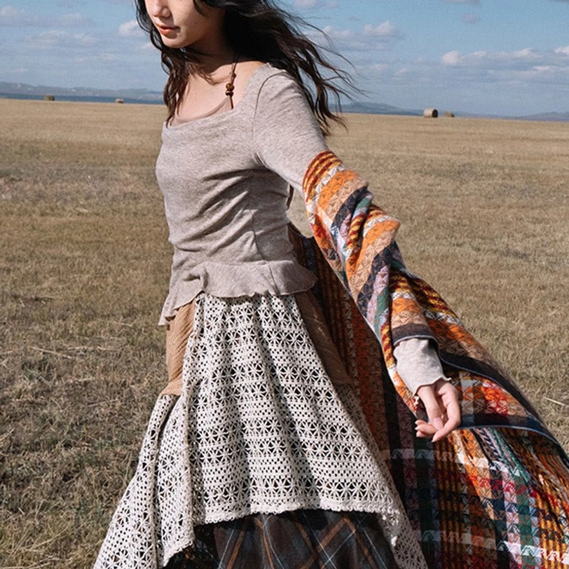 Tibetan tassel shawl color swatch and fringe detail highlighting artisan craftsmanship and traditional design