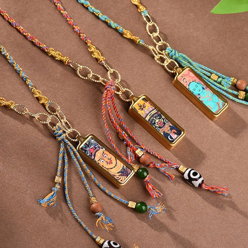 Tibetan thangka pendant necklace lifestyle wear showing spiritual jewelry with woven rope