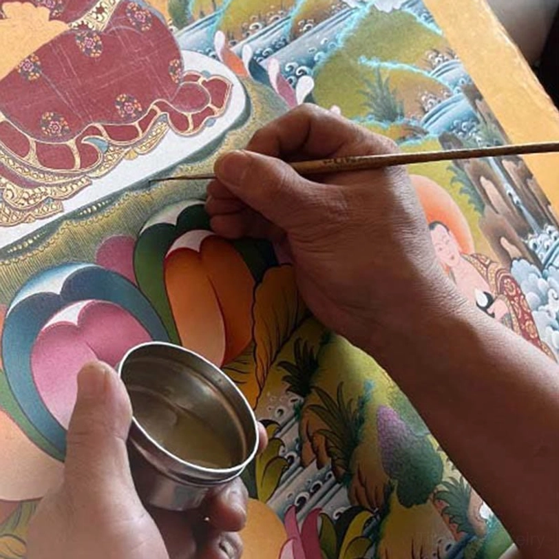 Tibetan thangka scroll with layered symbolic imagery representing enlightenment and inner transformation