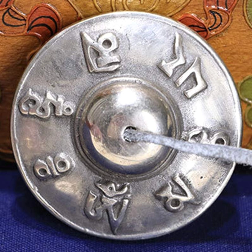Large Tibetan tingsha bell full embossed six true words mantra silver copper leather strap painted wooden backdrop