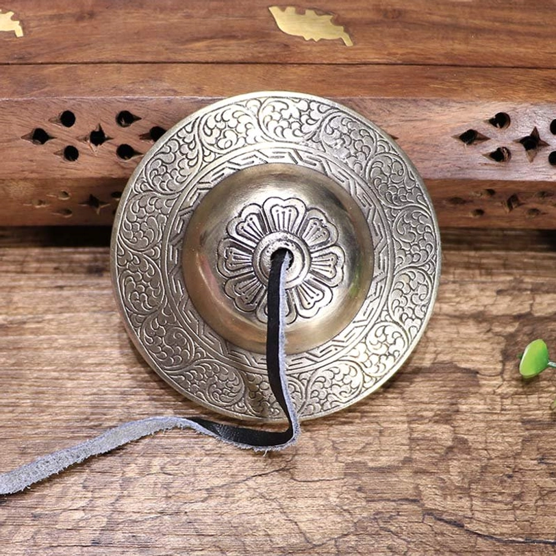 Tibetan tingsha brass cymbal top-down wooden shelf carved leather strap attached