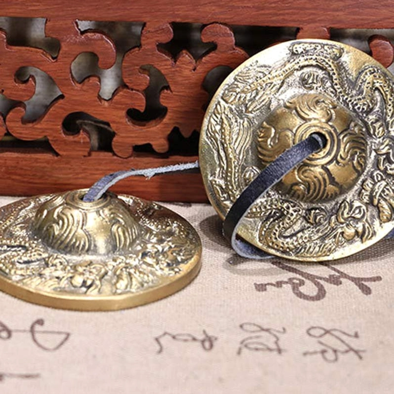Traditional tibetan tingsha bells with om mani padme hum mantra engraving for Buddhist meditation