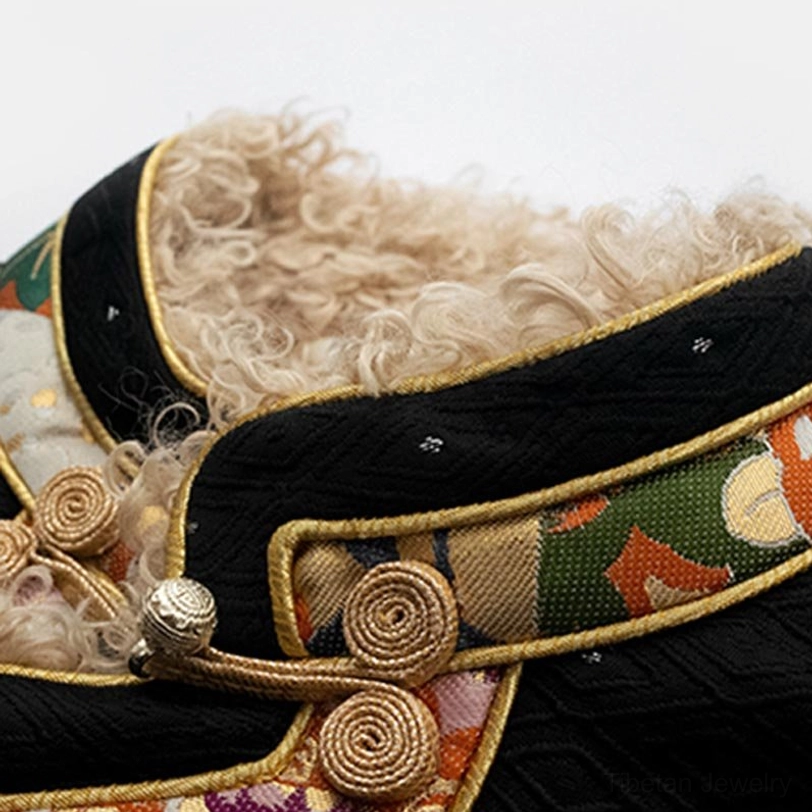 Tibetan fleece top showing complete ethnic embroidery and ornamental button closure construction