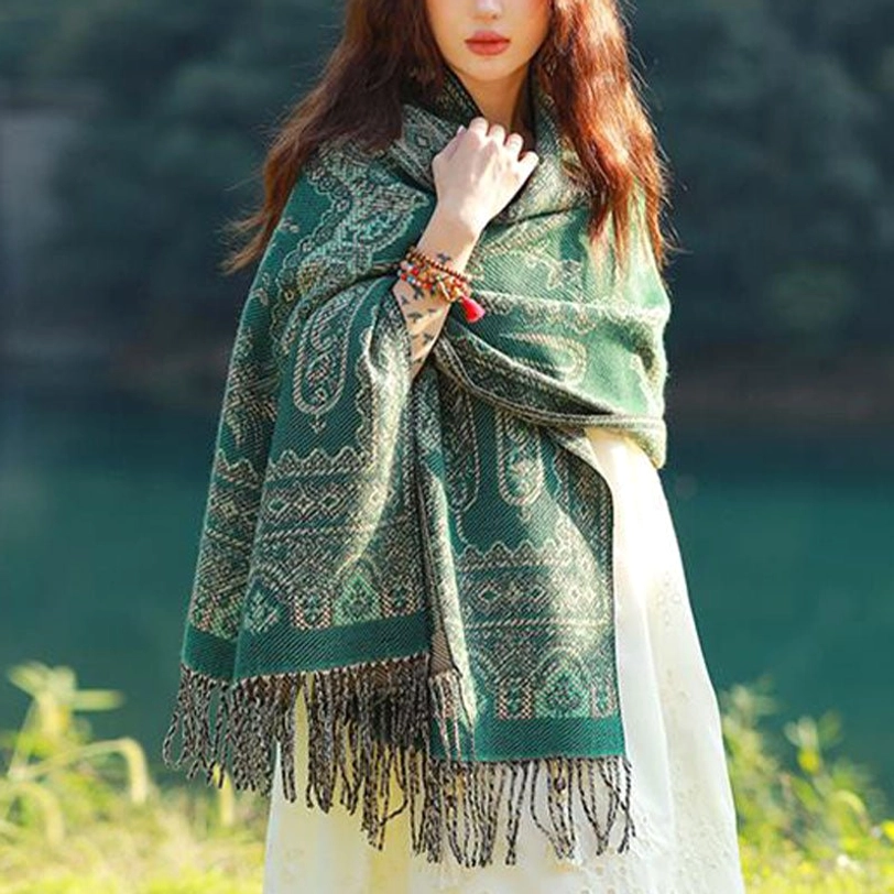 Tibetan ethnic shawl with traditional paisley and leaf motif, draped styling