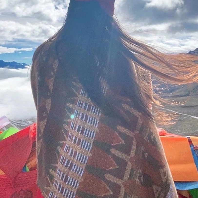 Tibetan ethnic tribal scarf with sacred geometric symbols, protective spiritual motifs and traditional Himalayan pattern design