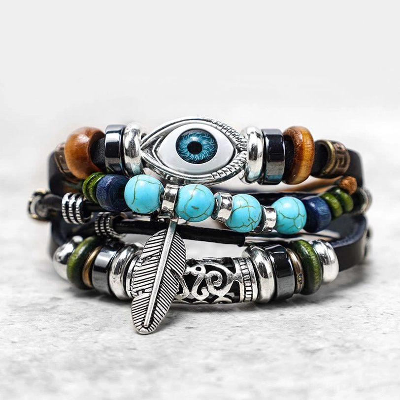 Tibetan evil eye turquoise leather bracelet set showing multiple straps feather charm and mixed stone beads
