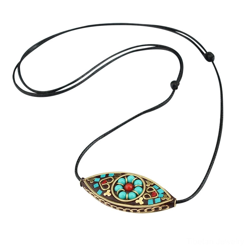 Tibetan turquoise marquise pendant worn long style on model, spiritual bohemian necklace aesthetic