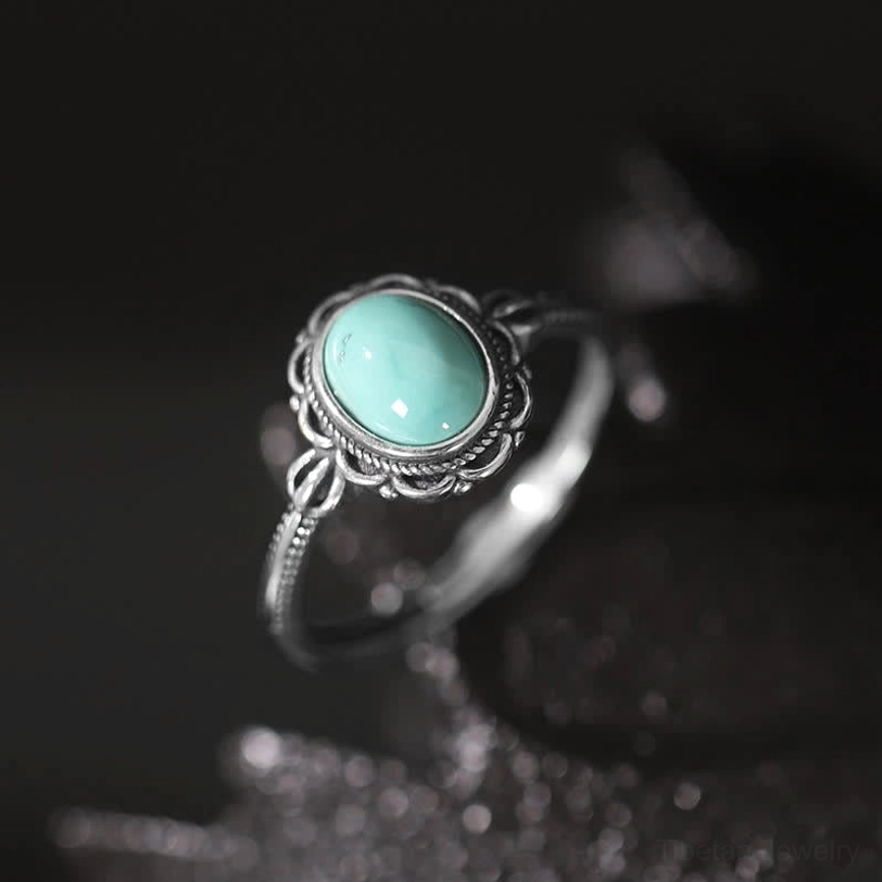 925 sterling silver tibetan ring with natural turquoise stone handmade by artisans, artisanal detail close-up