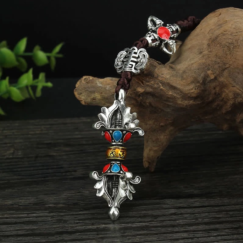 Tibetan Buddhist vajra hanging charm with silver-gold dual tone, colorful gemstone inlays, vajra pendants, and endless knot ornament on wooden root